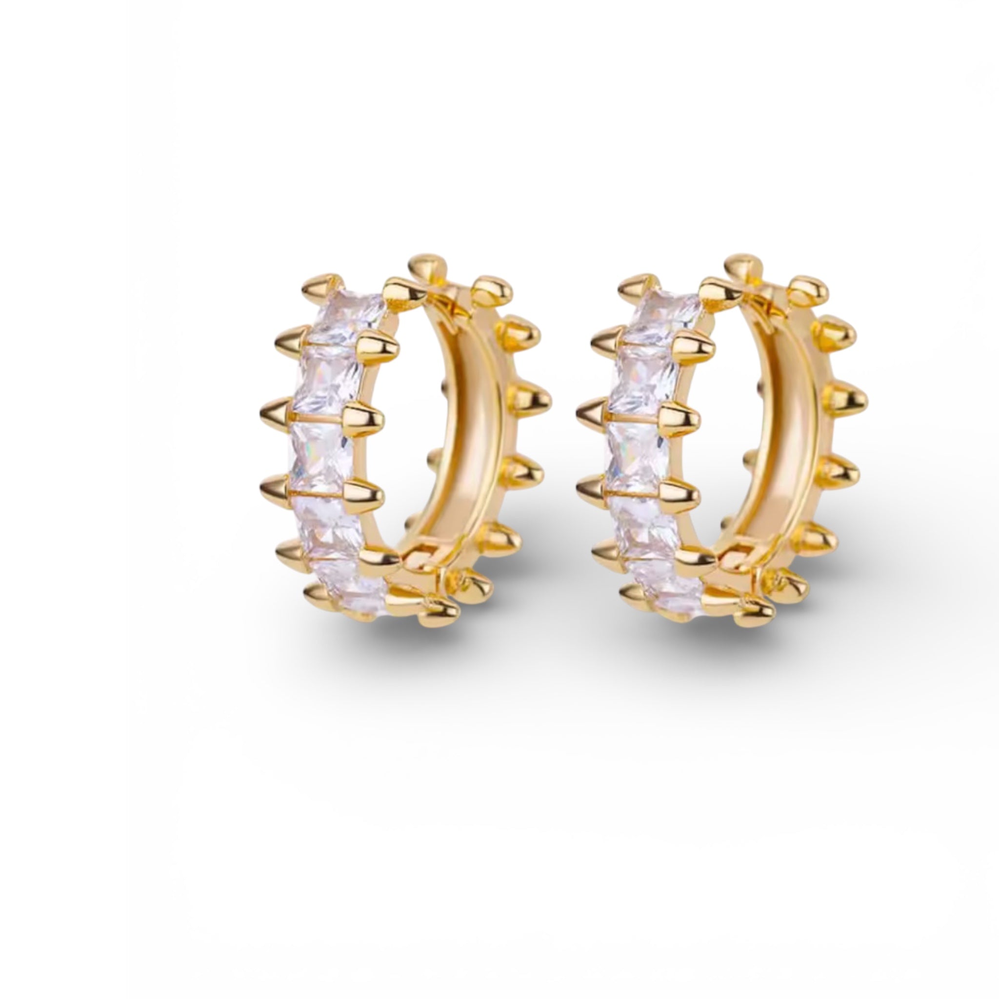 Gold huggie earrings with baguette cubic zirconia stones in 18K gold plated stainless steel