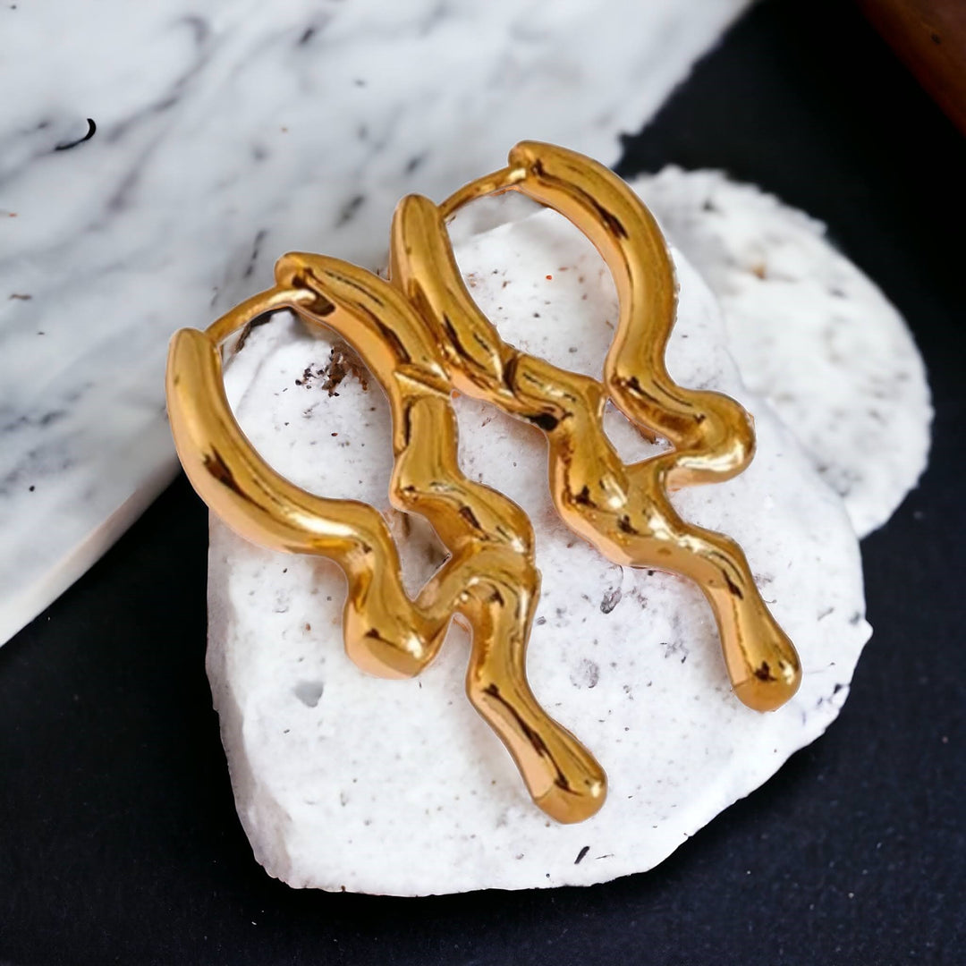 Gold abstract ripple hoop earrings, stainless steel, 18K gold plated, tarnish-resistant, hypoallergenic, minimalist design.