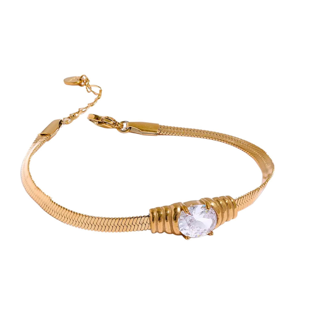 Aurora Radiance Herringbone Bracelet - Sophisticated gold herringbone bracelet featuring a single brilliant-cut cubic zirconia stone, perfect for adding elegance to any outfit.