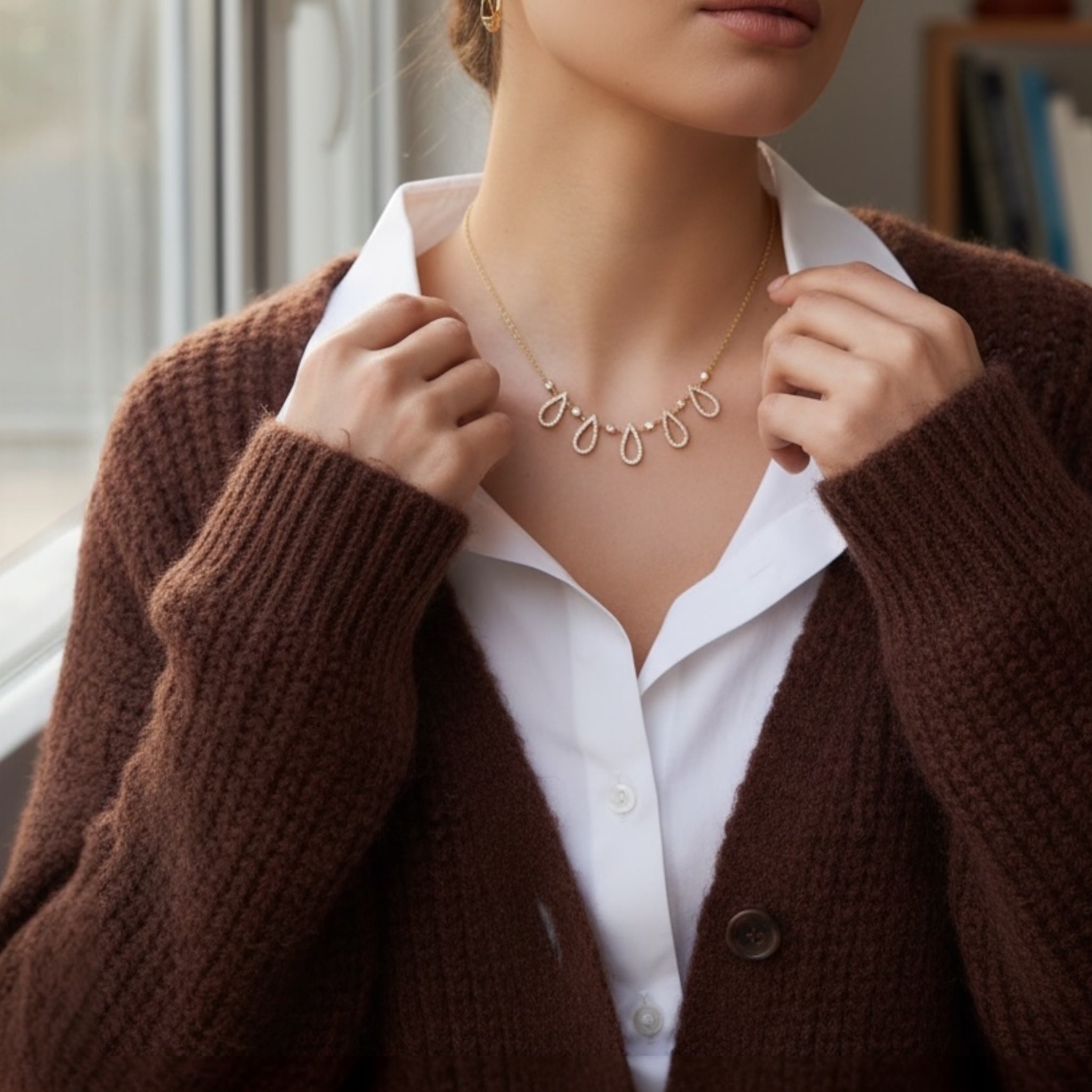 Gold teardrop pavé crystal cascading statement necklace