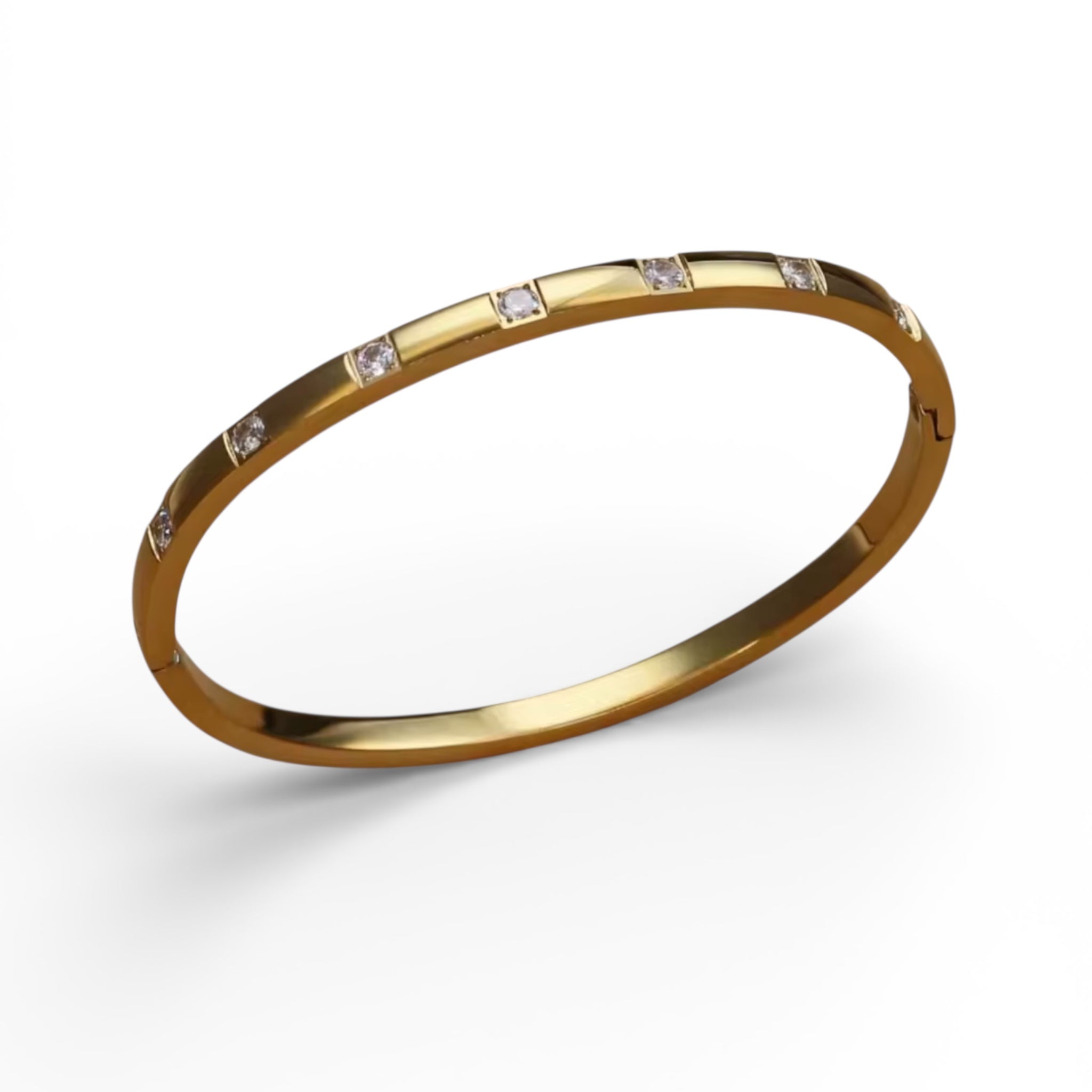 Minimalist gold bangle bracelet with delicate crystal stones