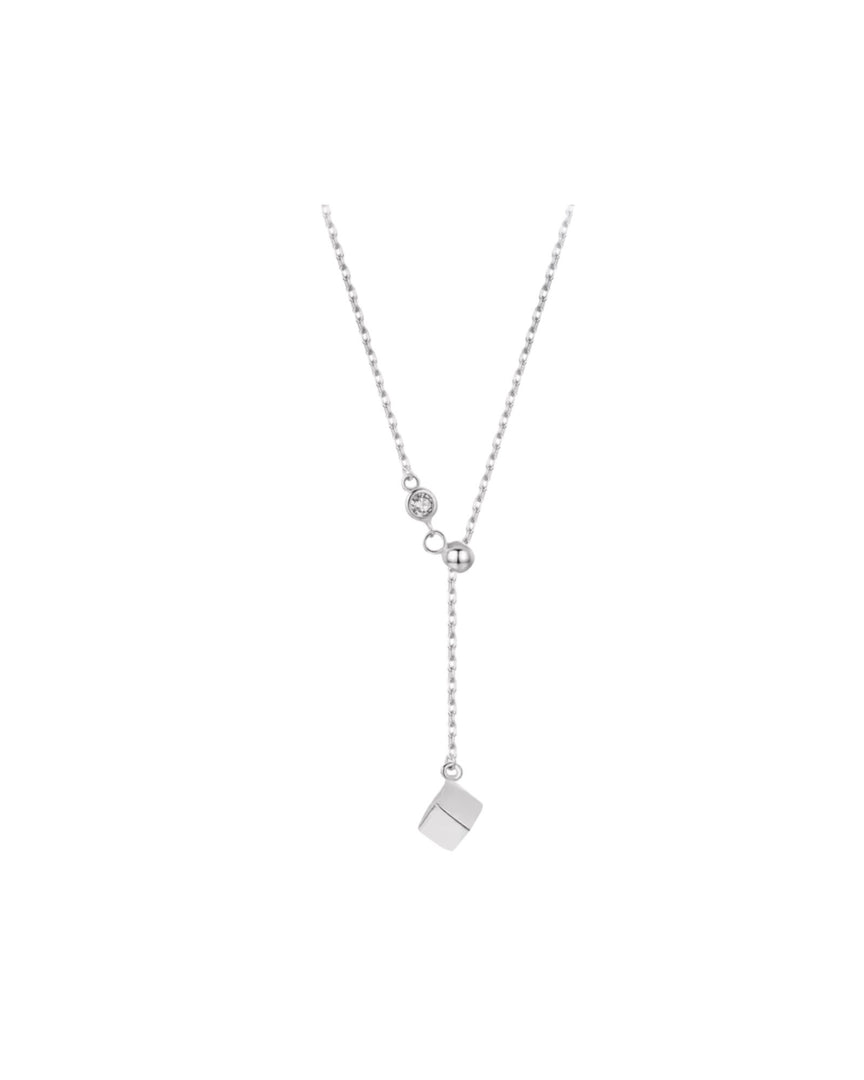 Minimalistic silver necklace with a cubic charm drop and delicate chain design, perfect for a sleek and contemporary look from Lia Haddi