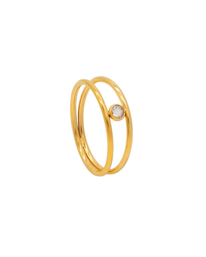 Stylish gold double-band ring with a single diamond accent, modern and elegant design by Lia Haddi Modern Jewelry.