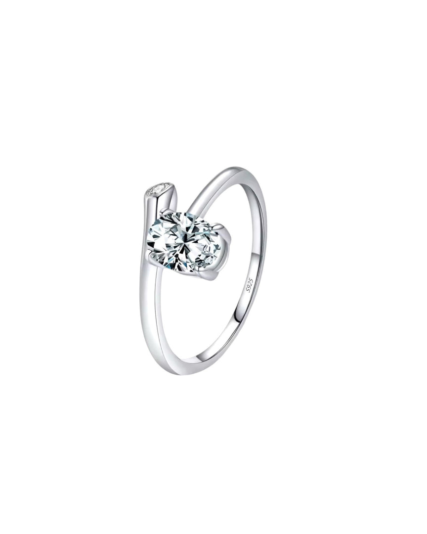 Stunning silver oval ring featuring a sparkling solitaire stone, an elegant accessory for any occasion. Affordable and chic modern jewelry from Lia Haddi.