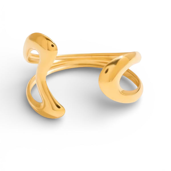 Modern sculptural gold cuff bracelet in 18K gold plated stainless steel