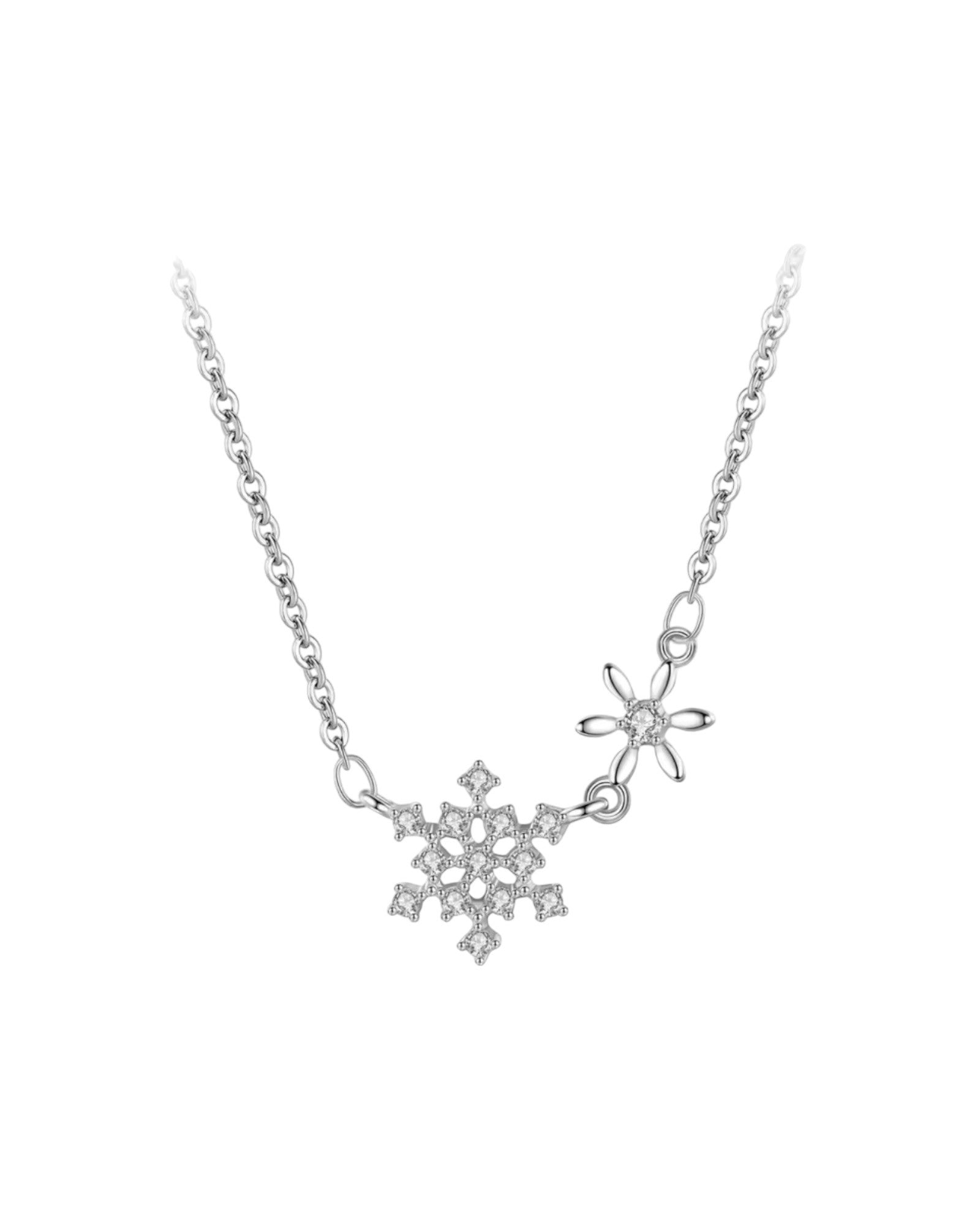 Delicate silver necklace featuring a snowflake-inspired pendant with sparkling details, perfect for adding a touch of winter elegance from Lia Haddi Modern Jewelry.