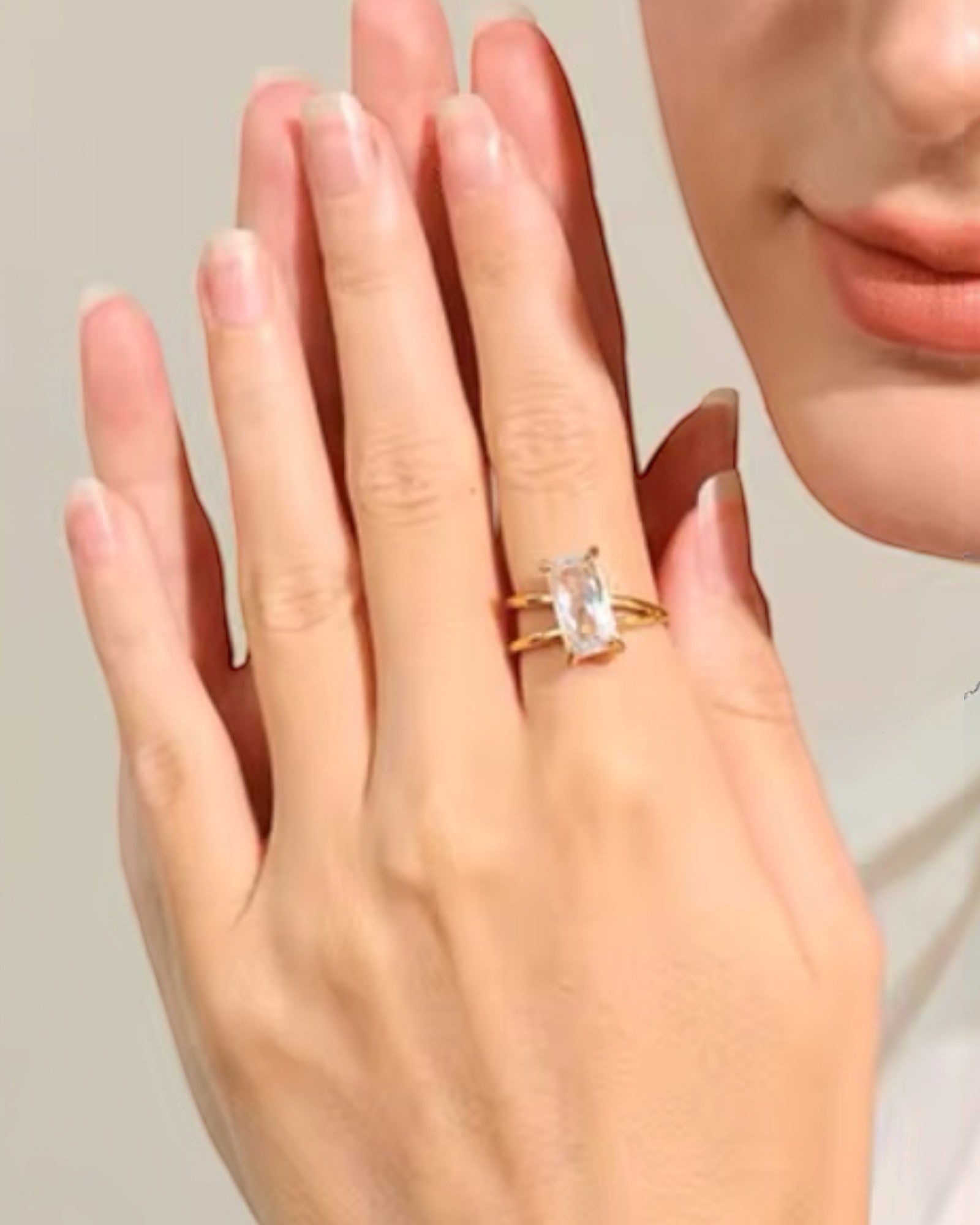 Gold geometric solitaire ring featuring a rectangular crystal centerpiece, a bold and modern design by Lia Haddi Modern Jewelry