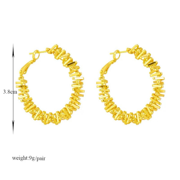 18K Gold Plated Industrial Spiral Hoop Earrings - Tarnish resistant, water-resistant, hypoallergenic, eco-friendly, elegant leaf shape design, affordable luxury by Lia Haddi Modern Jewelry.