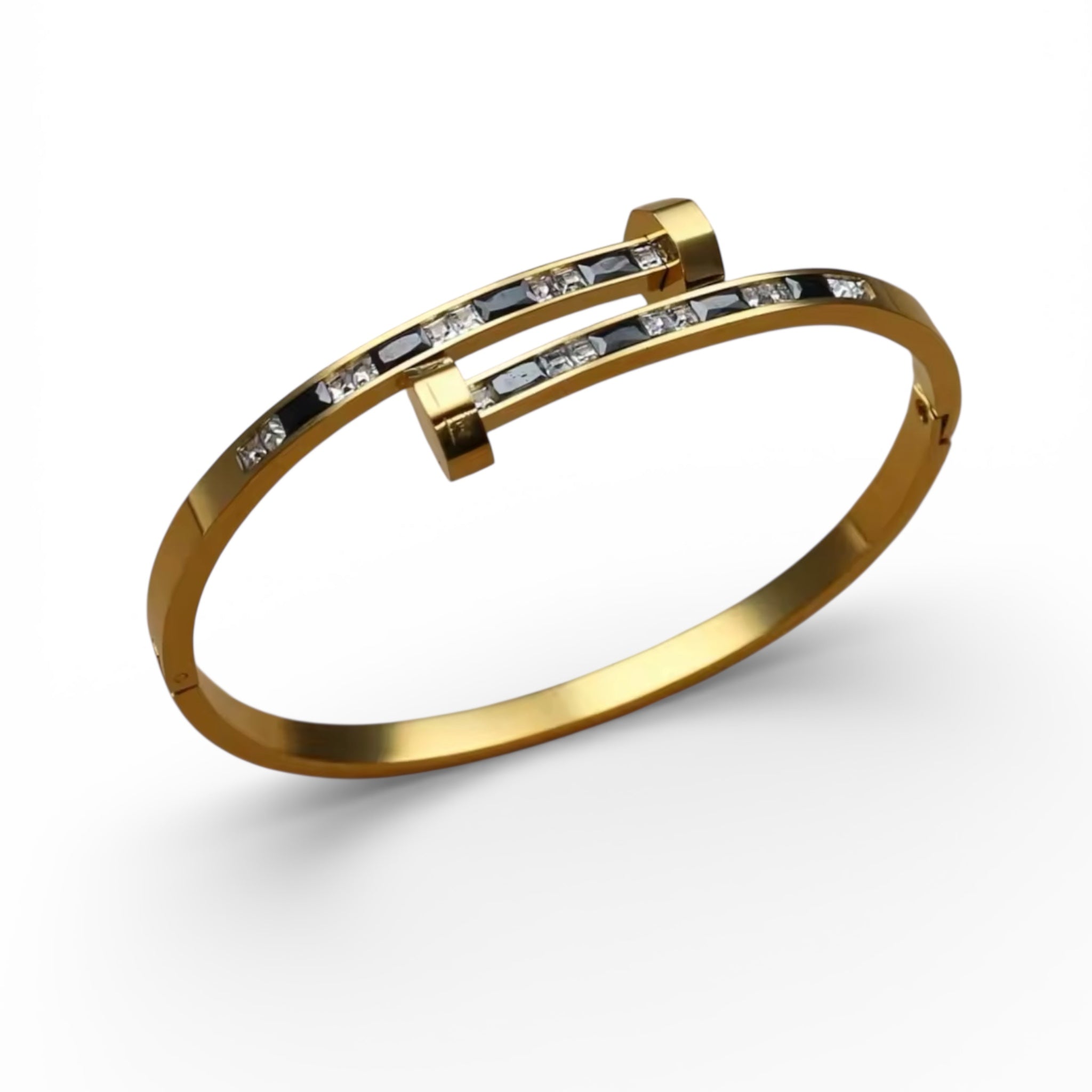 Gold nail inspired bangle with black and clear stones in stainless steel