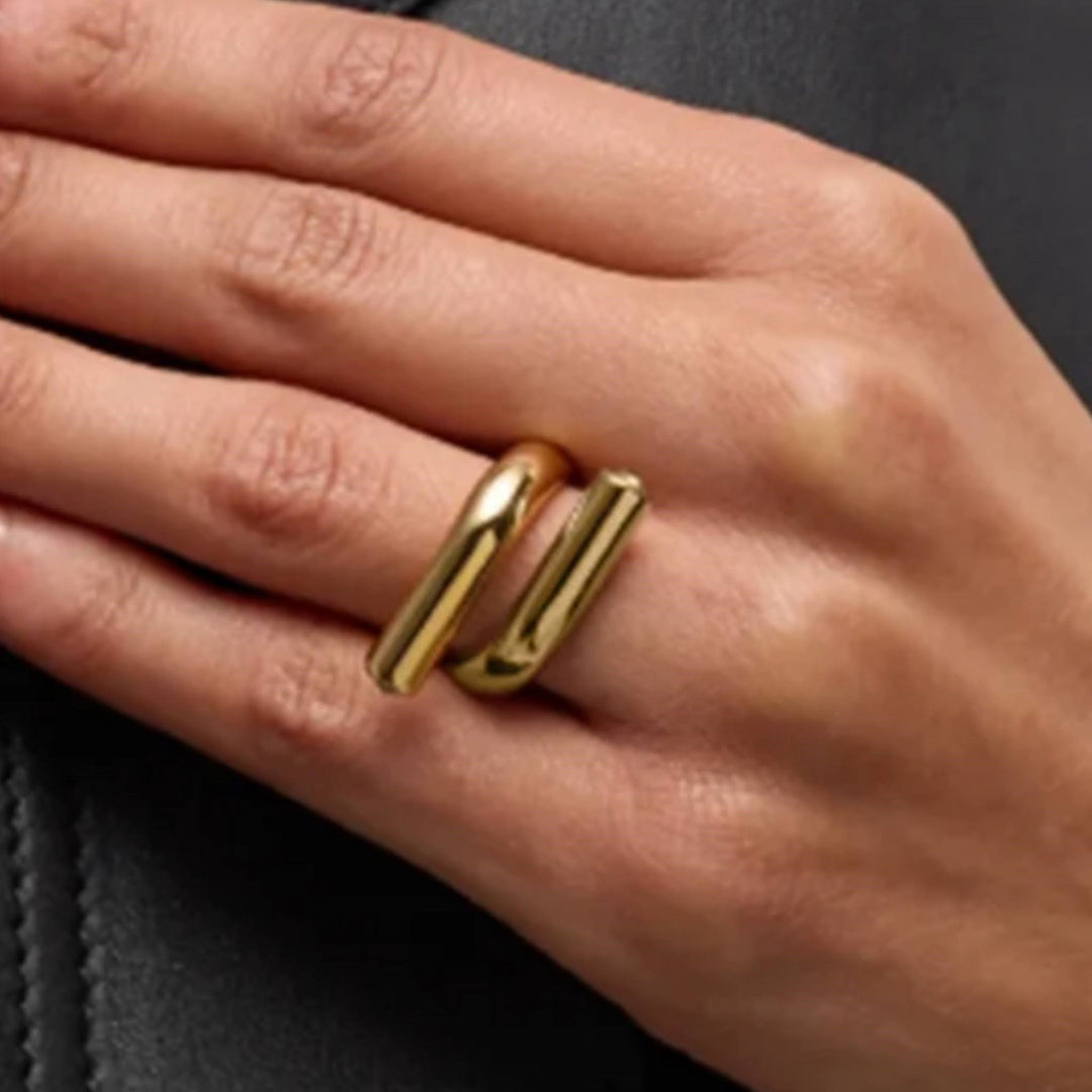 Modern Twist Ring - Unique gold ring with a sleek, twisted design, perfect for a contemporary look.