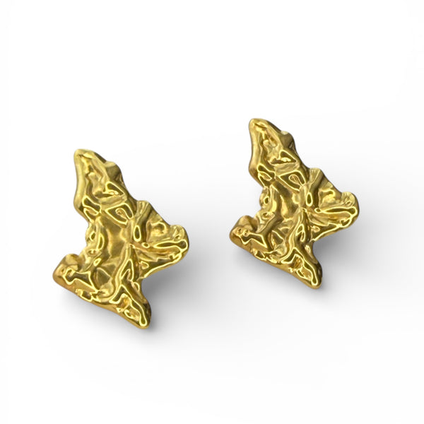 Gold sculptural stud earrings with molten texture design