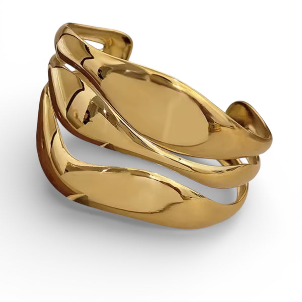 Sculptural layered gold cuff bracelet in 18K gold plated stainless steel