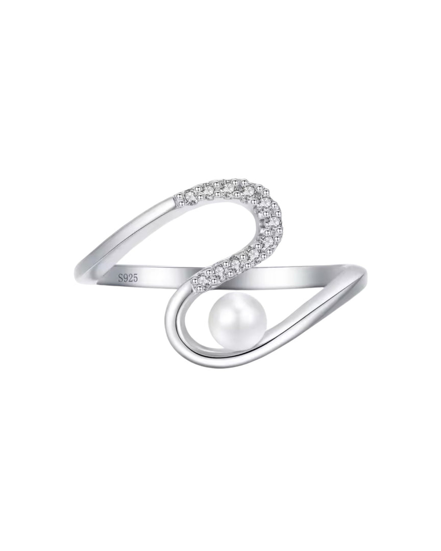 Sterling silver curved band adorned with a delicate pearl and sparkling diamond accents, showcasing modern elegance from Lia Haddi