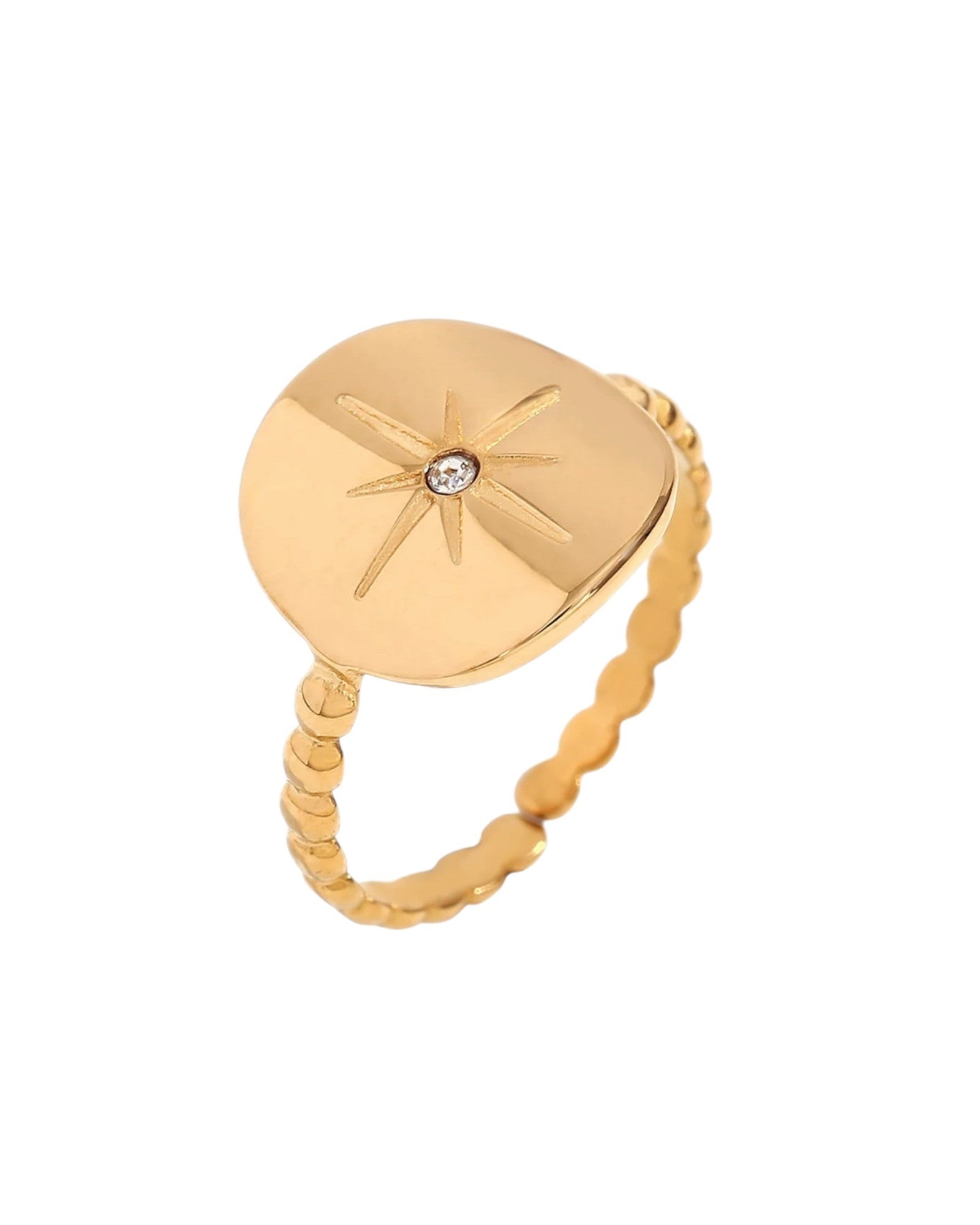 Gold ring with a starburst design and a sparkling diamond center, featuring a textured band by Lia Haddi Modern Jewelry.