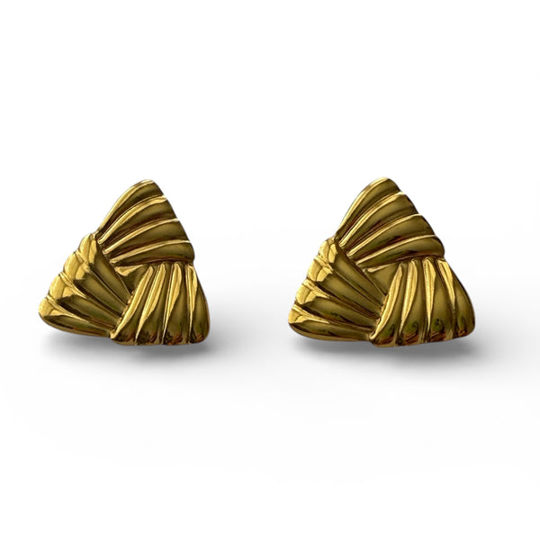 Gold sculptural stud earrings with folded shell-inspired texture