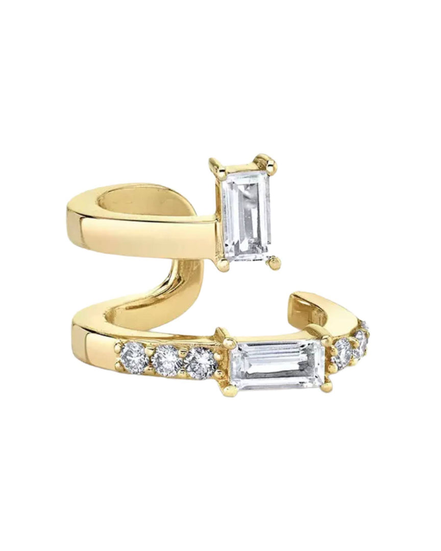 Gold-plated dainty ear cuff with sparkling baguette and round-cut zirconia stones. From Lia Haddi.