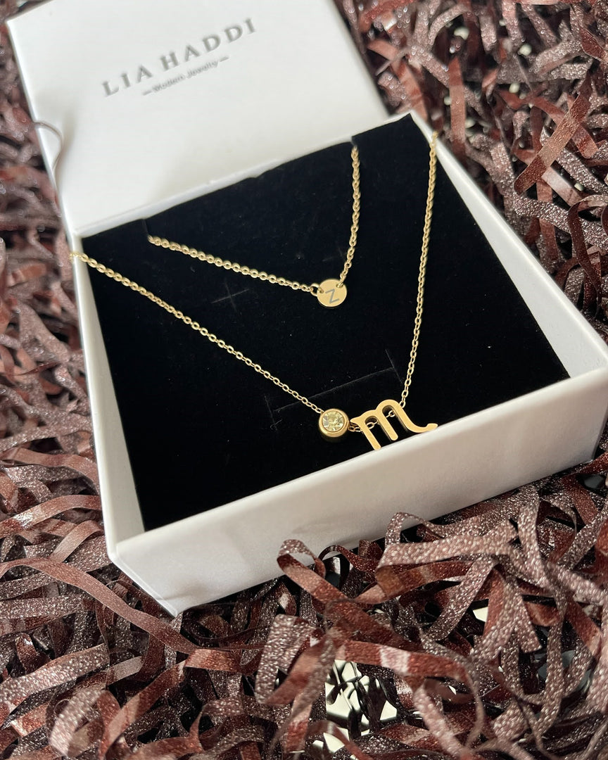 Lia Haddi Adjustable Chain Necklace - Stainless Steel, 14K Yellow Gold Plated, 45cm Length, Tarnish Resistant, Water-Resistant, Hypoallergenic, Personalized and stylish design from Lia Haddi's collection. Charms for Letters, Zodiac, and Birthstone sold separately.