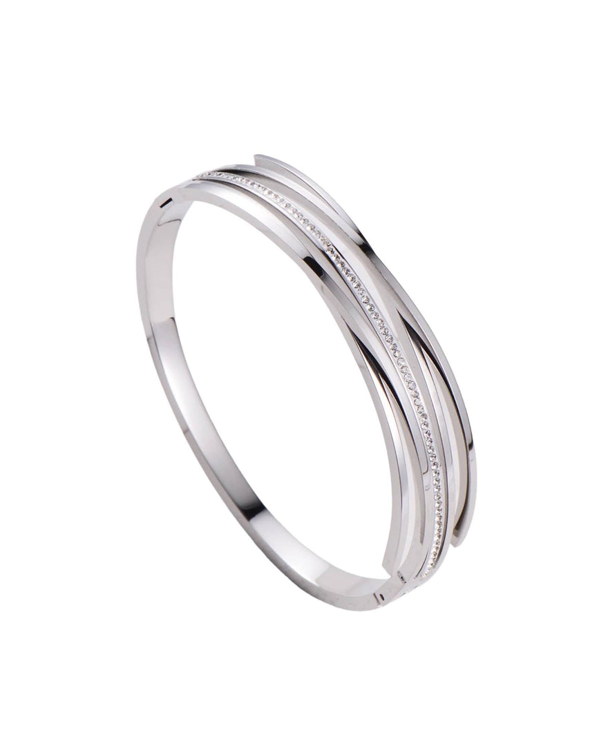 Alana Bangle Bracelet in sleek silver tone, featuring intricate detailing and a contemporary design for an elegant touch. From Lia Haddi.