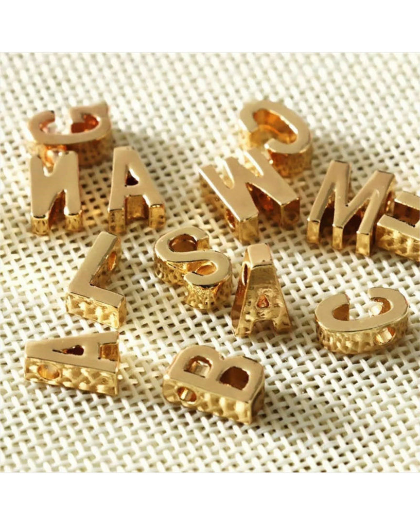 Lia Haddi Letter Charm - Stainless Steel, 14K Yellow Gold Plated, Tarnish Resistant, Water-Resistant, Hypoallergenic, Personalized and stylish design from Lia Haddi's collection. Charms for Zodiac, Birthstone, and Adjustable Necklace sold separately.